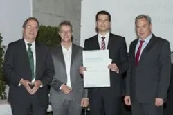 Prof. Dr.-Ing. Jörg Eberspächer, Prof. Dr.-Ing. Dr. rer. nat. Holger Boche, Dr.-Ing. Ullrich Mönich und Manfred Fleischmann (Manager Rohde & Schwarz)